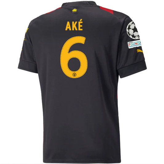 Puma Manchester City Nathan Ake Away Jersey w/ Champions League Patches 22/23 (Puma Black/Tango Red)